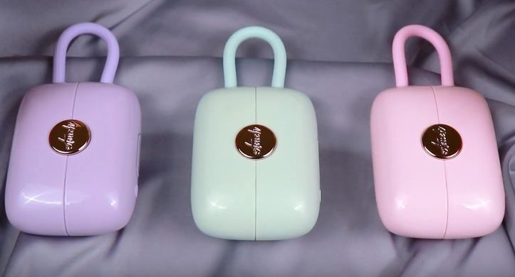 Вакуумний кліторальний стимулятор + віброяйце у кейсі Otouch Louis Vibrate Pink (діаметр 2,8 см) зображення
